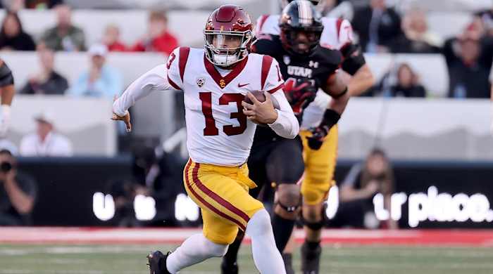 Oct 15, 2022; Salt Lake City, Utah, USA; USC Trojans quarterback Caleb Williams (13) runs against the Utah Utes in the first quarter at Rice-Eccles Stadium.